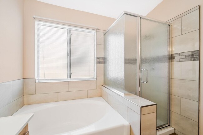 Building Photo - Gated Living with Community Pool & Thoughtfully Designed Open Layout!