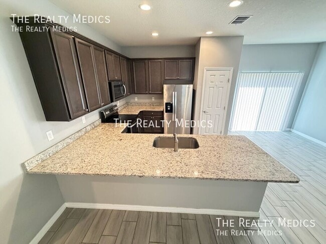 Building Photo - 491 Ixora Ave NW
