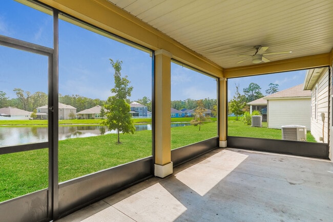 Building Photo - Home with Pond Views & Screened-In Patio