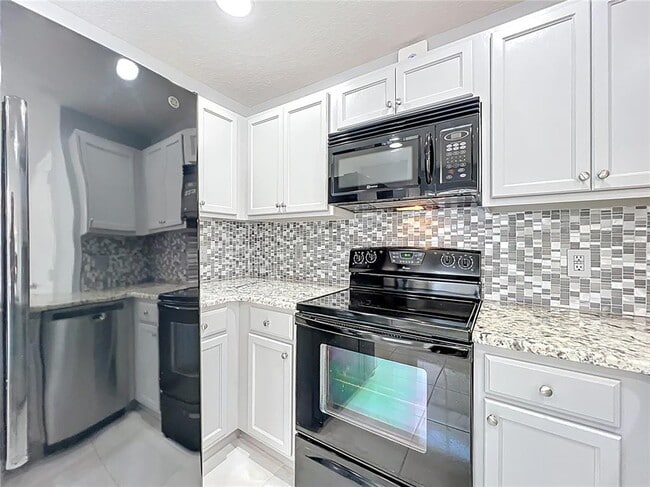 Building Photo - 12625 Tanja King Blvd