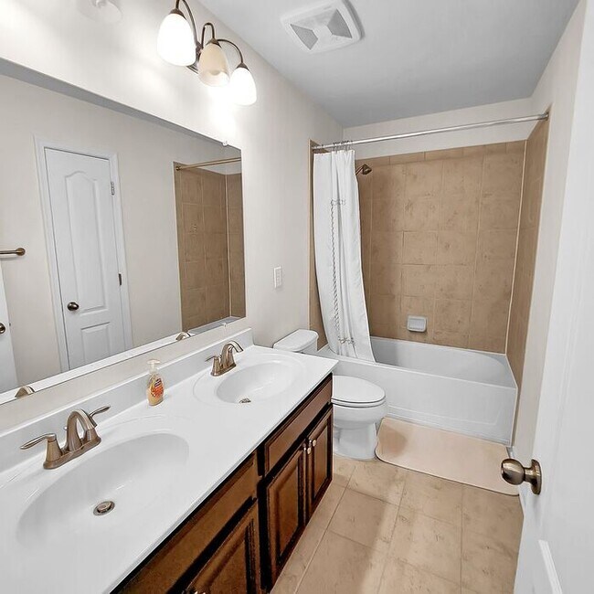Building Photo - Stately End Unit 3-Level Townhome, 3 Bedro...