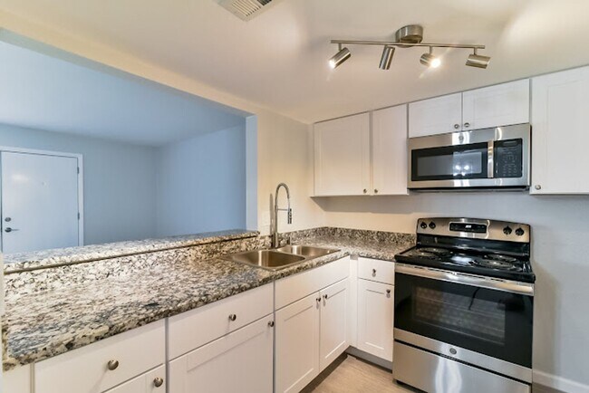 Building Photo - Move In Specials -  Renovated Apartments! ...