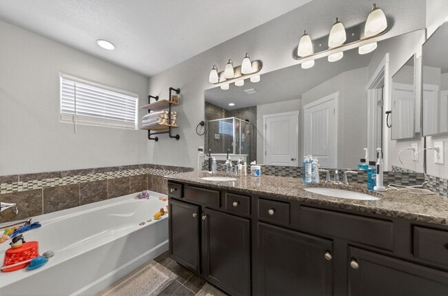 Building Photo - Upgraded 4-Bedroom Corner Lot Home with Mountain Views