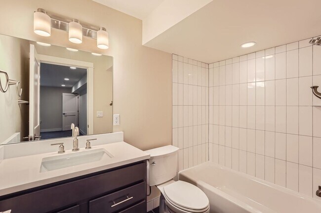 Building Photo - Modern 4BR Townhome Near Sloan’s Lake | Rooftop Deck, Finished Basement & Garage