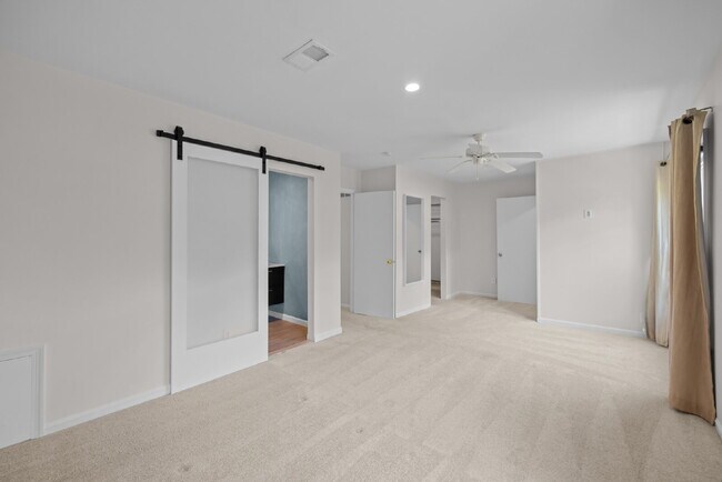 Building Photo - Completely Renovated Corner Townhome with Modern Kitchen, Designer Baths, and Private Yard