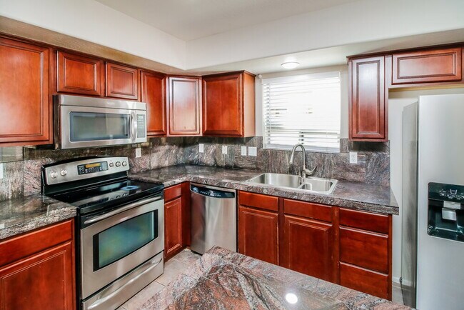 Building Photo - 44852 W Woody Rd