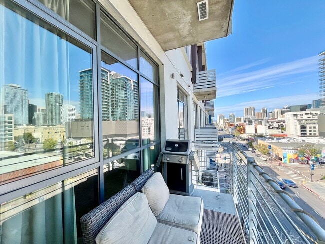 Building Photo - Stunning Corner Loft in East Village with Floor-to-Ceiling Windows & City Views!