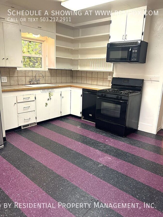 Building Photo - 214 NE Bryant St