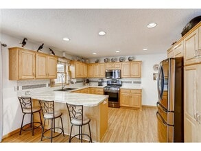 Building Photo - Single Family Home + Over 1/2 Acre Lot!! Welcome Home to Rockford MN!