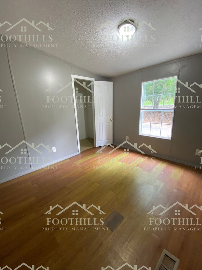 Building Photo - Spacious 4-Bedroom Double-Wide Mobile Home...