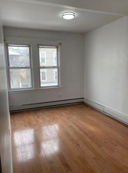 Building Photo - 22-18 124th St