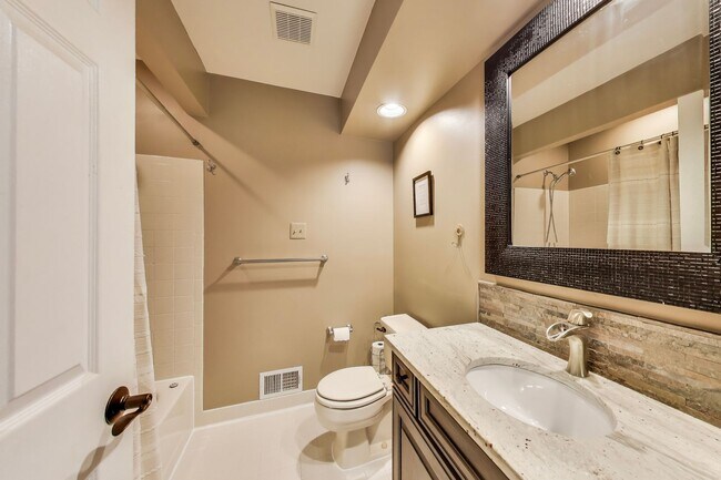 Building Photo - COMINGS SOON - Beautifully Updated Winchester-Built Townhome Backing to Serene Parkland.
