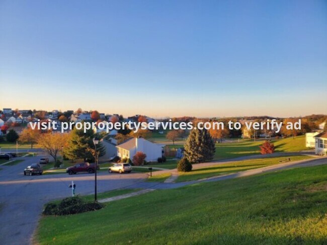 Building Photo - Charming Raised Rancher With Lawn Care Included