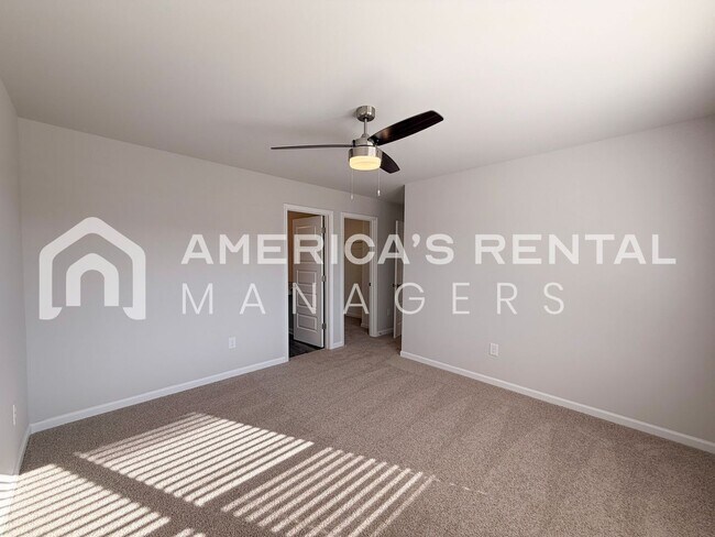 Building Photo - Spacious Two-Story Townhome with Open Layout!