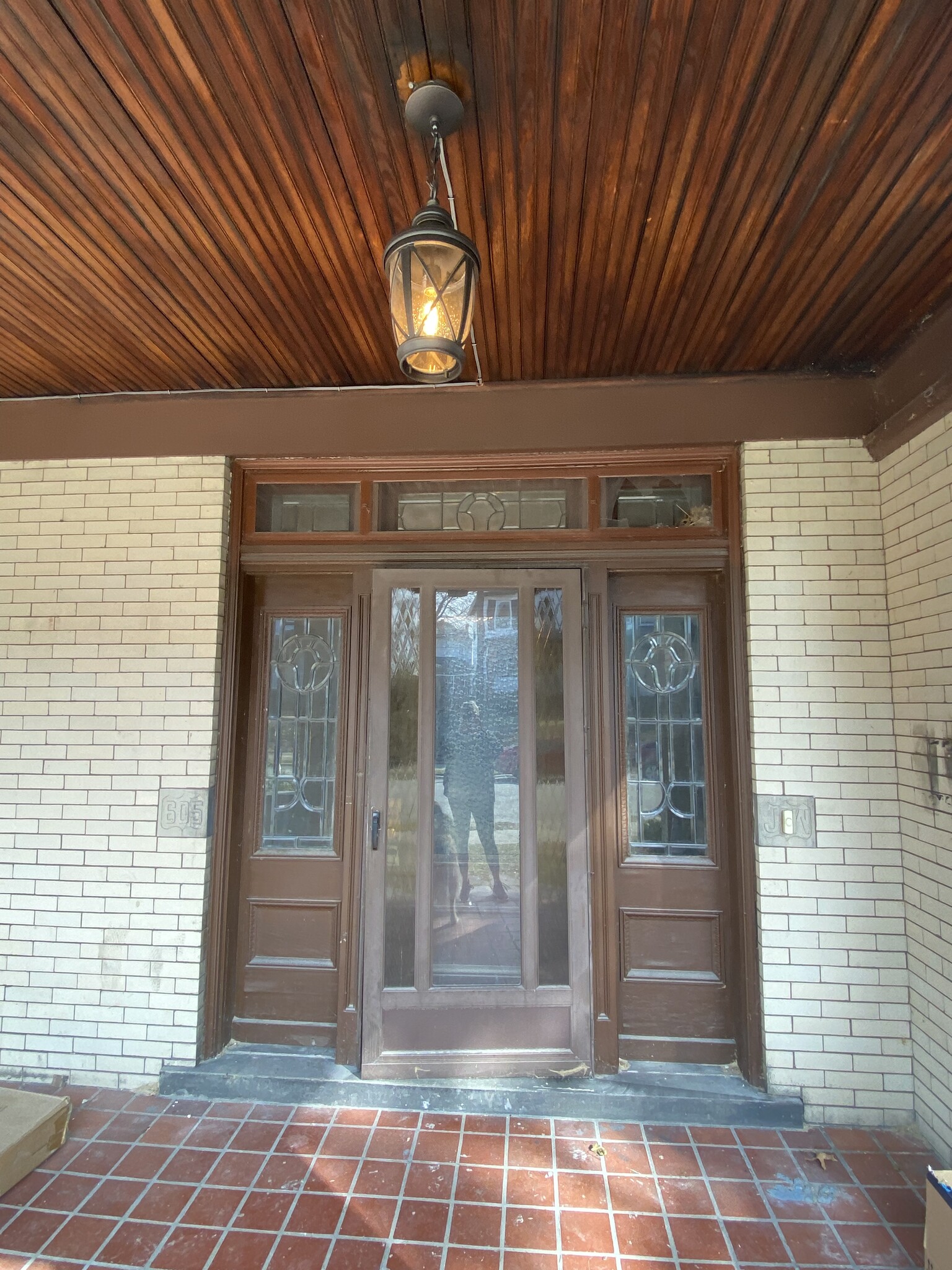 Front door of apartment building. - 605 Beechwood Ave