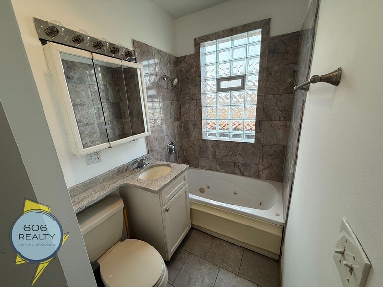 Building Photo - 5207 W Belmont Ave