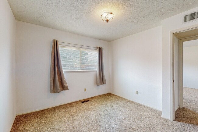 Building Photo - 7309 Coulson Dr NE