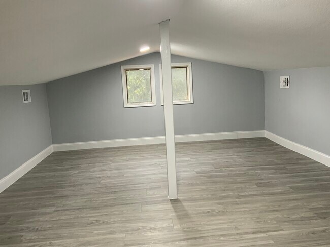 3rd floor two small windows with energy efficient screens - 3816 Byers Ave