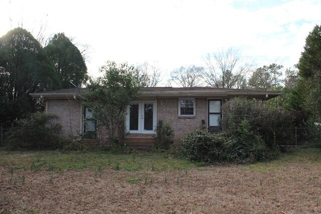 Building Photo - Welcome to this beautiful brick home nestl...