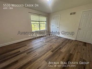 Building Photo - 5530 Wooded Creek Dr