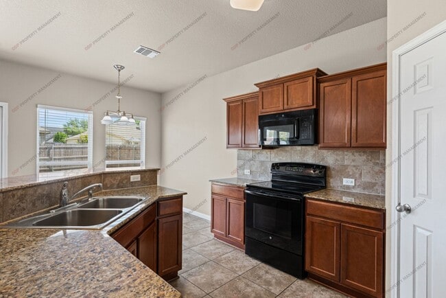 Building Photo - 8012 Redbrush