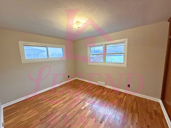 Building Photo - Charming 3-Bedroom Home with Hardwood Floors, Updates & Fenced Yard.