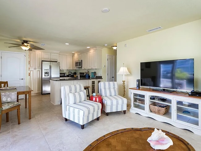 Building Photo - Stunning 2/1 available now at Waterside at Coqunia Key!