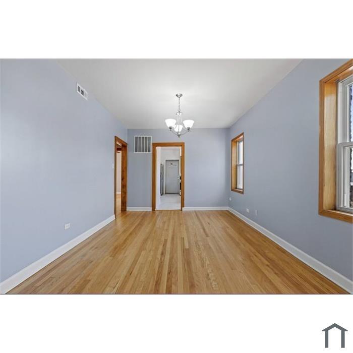 Building Photo - 5639 N Artesian Ave