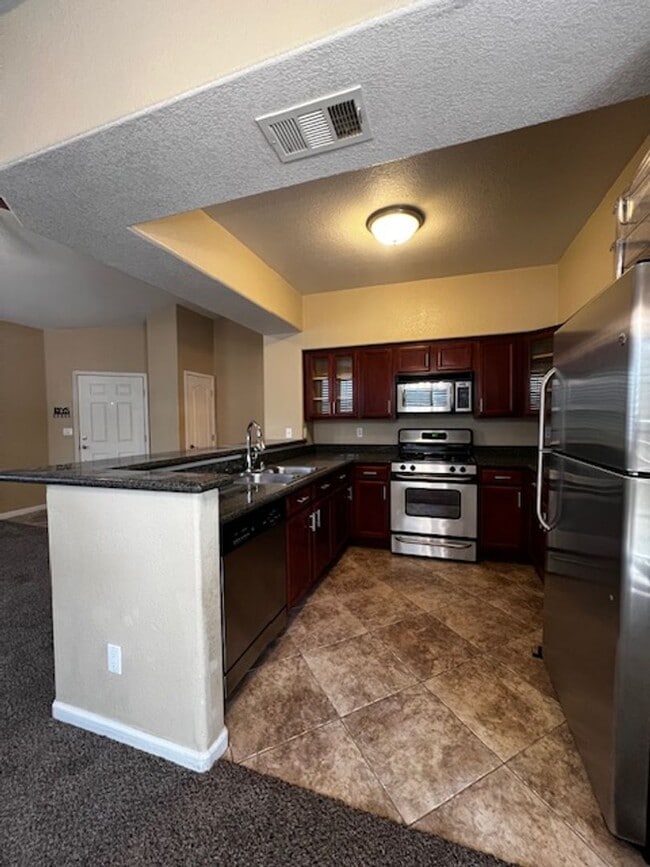 Building Photo - 3 Bedroom Condo - Gated - Summerlin - Detached Garage- New Carpet