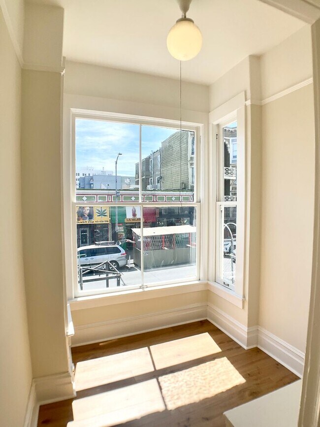 Building Photo - LOWERED PRICE! FULL FLOOR FLAT! Bay Window...