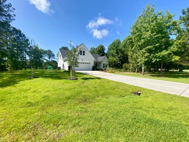 Building Photo - Welcome to Lake Life! Four Bedroom, Single...
