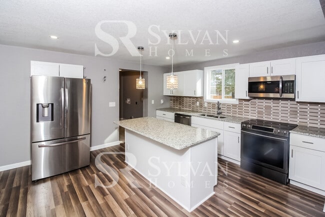 Building Photo - Turn the key. Enter. Smile. Repeat every day!