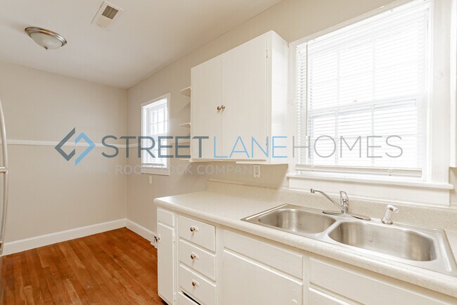 Building Photo - REDUCED! - NOW OFFERING HALF OFF FIRST FUL...