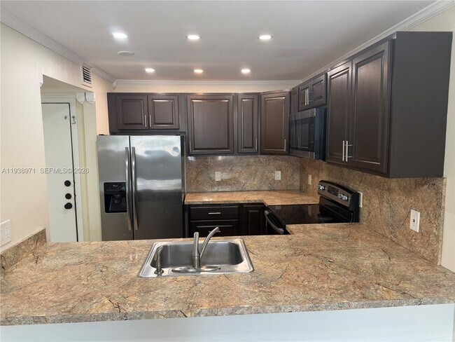 Building Photo - 10400 SW 108th Ave