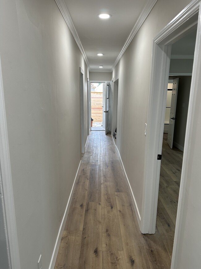 Long hallway with direct access to private backyard patio - 4230 W 169th St