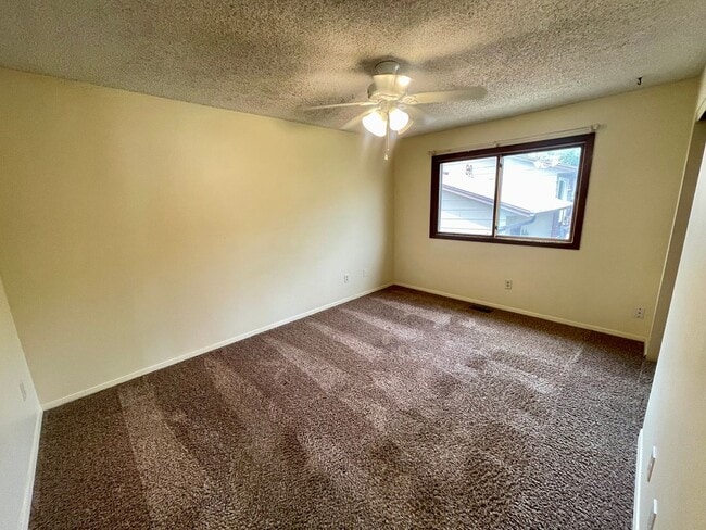 Building Photo - 4 Bed, 2 Bath Loveland, CO Home- Fenced Backyard, A/C, & 2 Car Garage!