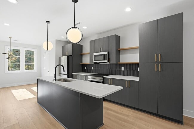 Building Photo - Bishop at Briar Creek, an end-unit townhome