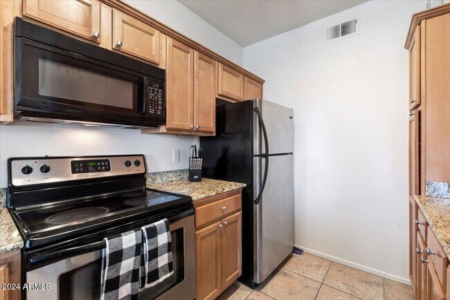 Building Photo - 7009 E Acoma Dr
