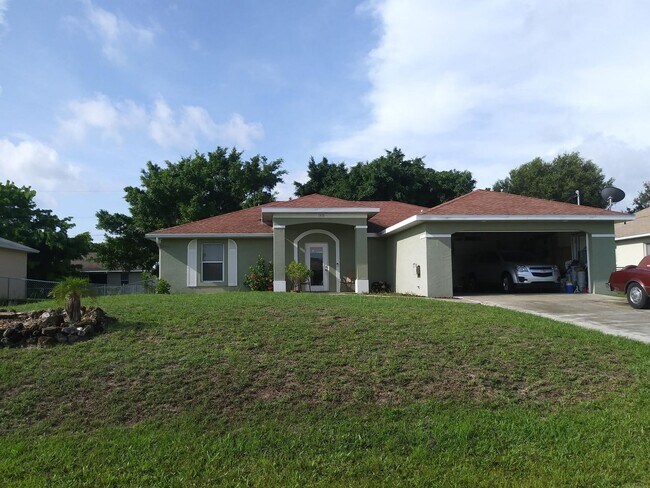 Building Photo - Single Family SW area Home with a Fenced Yard