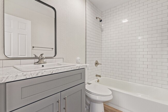 Building Photo - Stylish. Newly Renovated. Cozy, Boutique Community - On Broadway Apartments