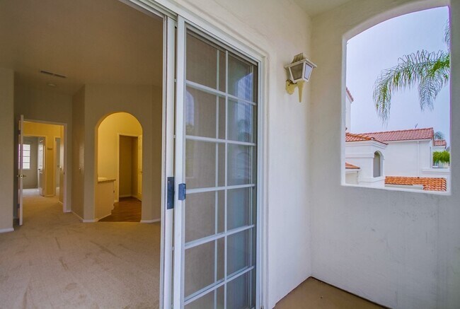 Building Photo - Spacious Townhome in San Marcos, 2-Car Garage, and a Tropical Community Pool!!