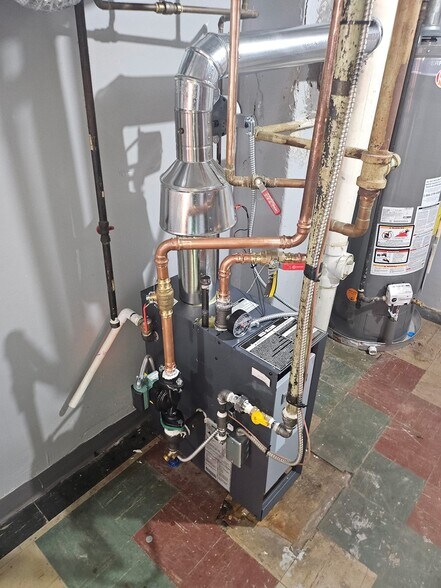 New heating system - 1268 Stirling St