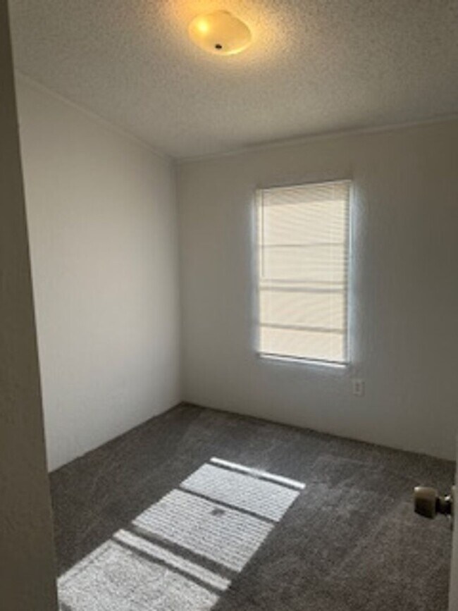 Building Photo - 3/2 single wide; all appliances provided