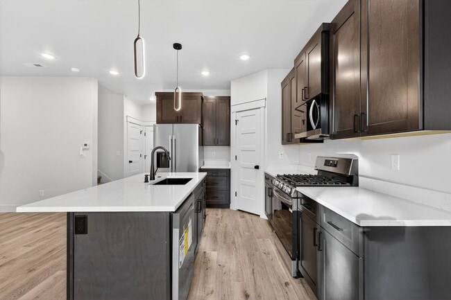 Building Photo - $500 off first month - BRAND NEW 3 BED 2.5 BATH TOWNHOMES WITH 2 CAR GARAGE