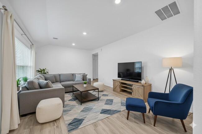 Building Photo - Like-new three bedroom single story home featuring a spacious open floor plan ideal for modern li...