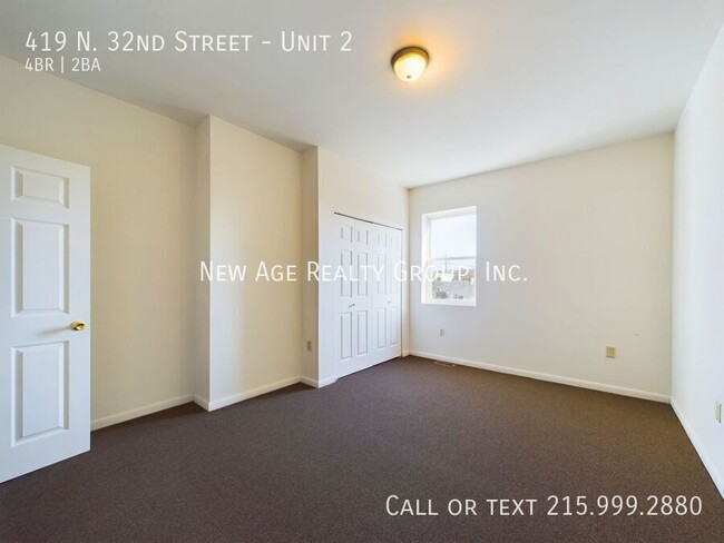 Building Photo - Spacious, Bi-level Apartment Available at ...