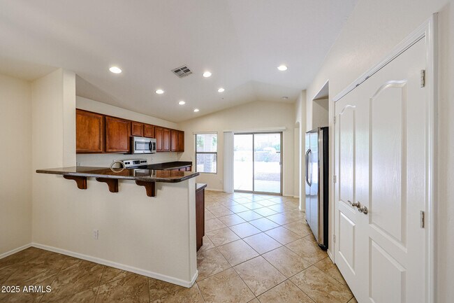 Building Photo - 12848 W Desert Mirage Dr