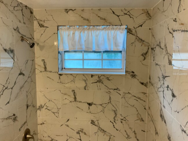 Building Photo - 10781 57th Ave N