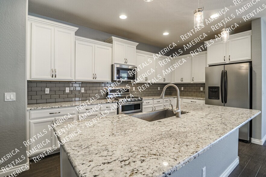 Building Photo - 10910 E Calypso Ave