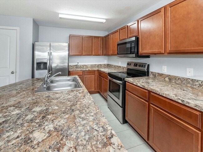 Building Photo - 5555 Maggiore Blvd